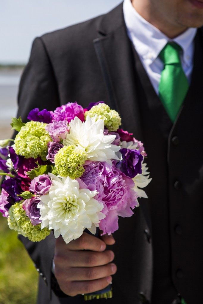 purple green lavender brides bouquet. peonies dahlias, roses sweet peas