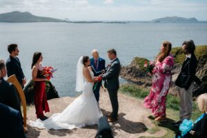 happy couple at their ceremony at Dunquin overlooking Dunquin pier Ireland Wedding Dunquin Pier - Dingle