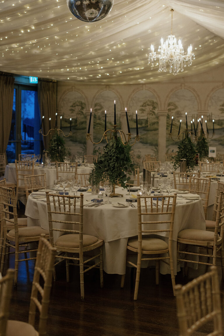 a timeless and elegant day at Bellinter house the tables all laid out for the dinner with candles and place settings