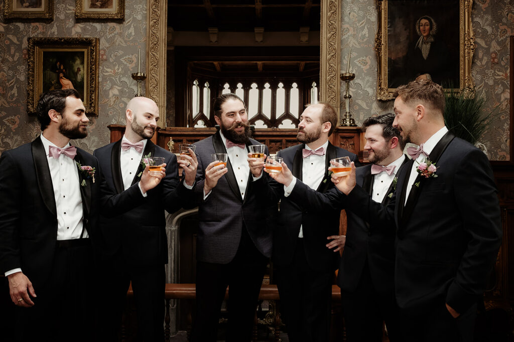 Groom and wedding guests having a toast at Markree Castle