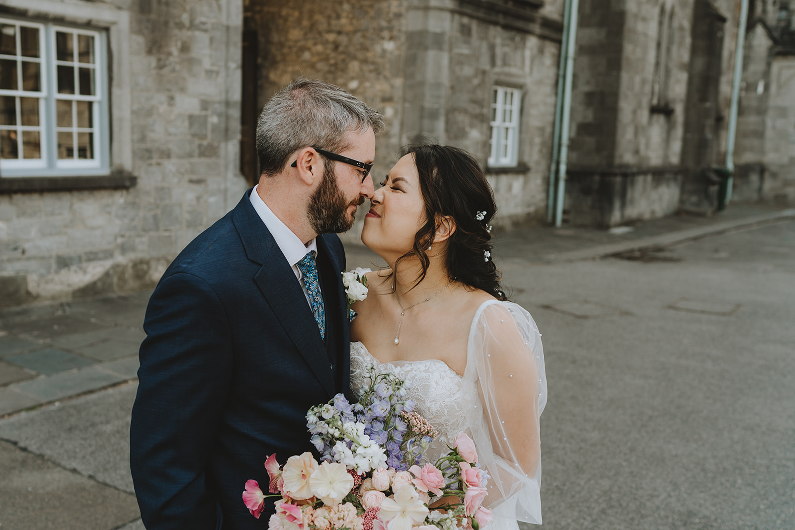 bride kam and ryan having a moment Kam squishing up her nose before the kiss